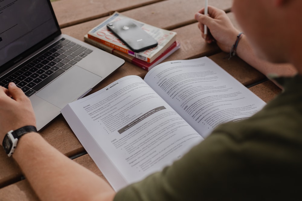 APSC main exam prep. Image shows person studying through online resources
