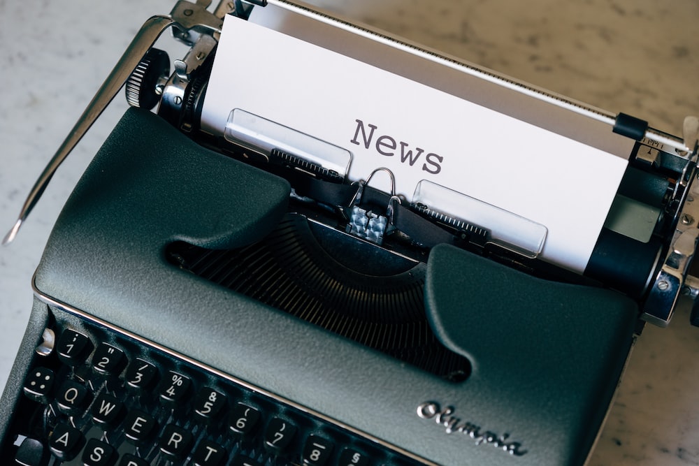 Current Affairs in APSC Mains. Image shows news and a typewriter